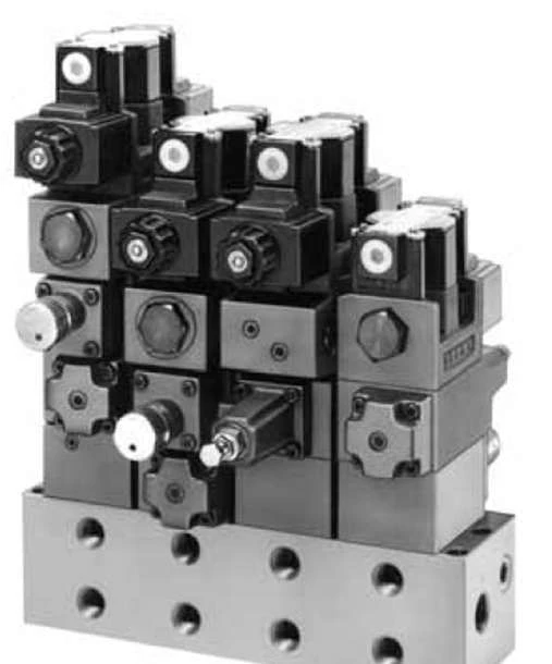 Yuken 01 Series modular valve stacks with DSG-01 directional valves on an MMC-01 base plate