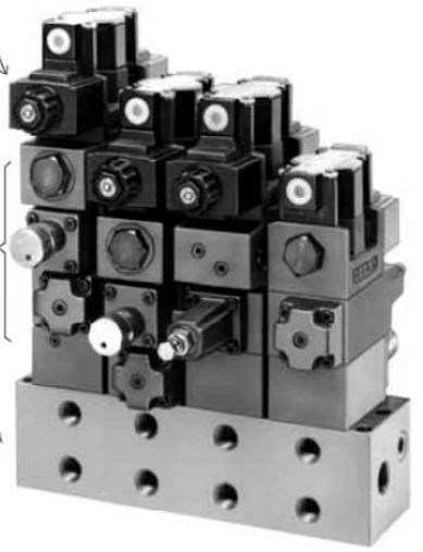 Yuken 03 Series modular valve stacks with DSG-03 directional valves on an MMC-03 base plate
